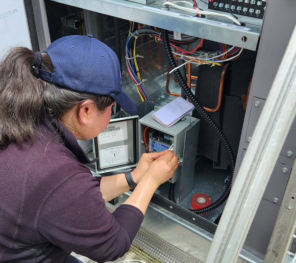Electrician Performing a Commercial Electrical Service in Downtown Raleigh, NC