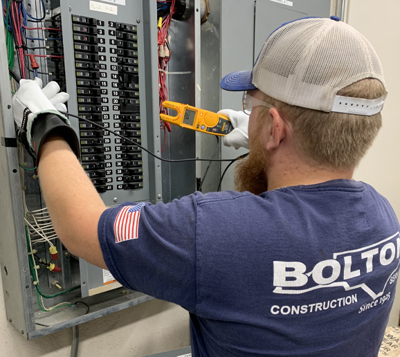 technician providing services such as Electrician, Electrical Contractor, & Emergency Electrician in Wake County, NC