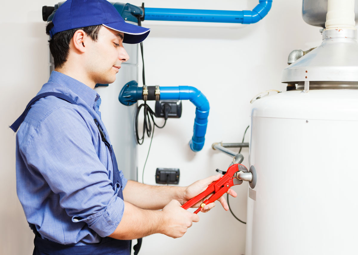 Technician Performing Water Heater Repair for Cary, North Carolina Homes